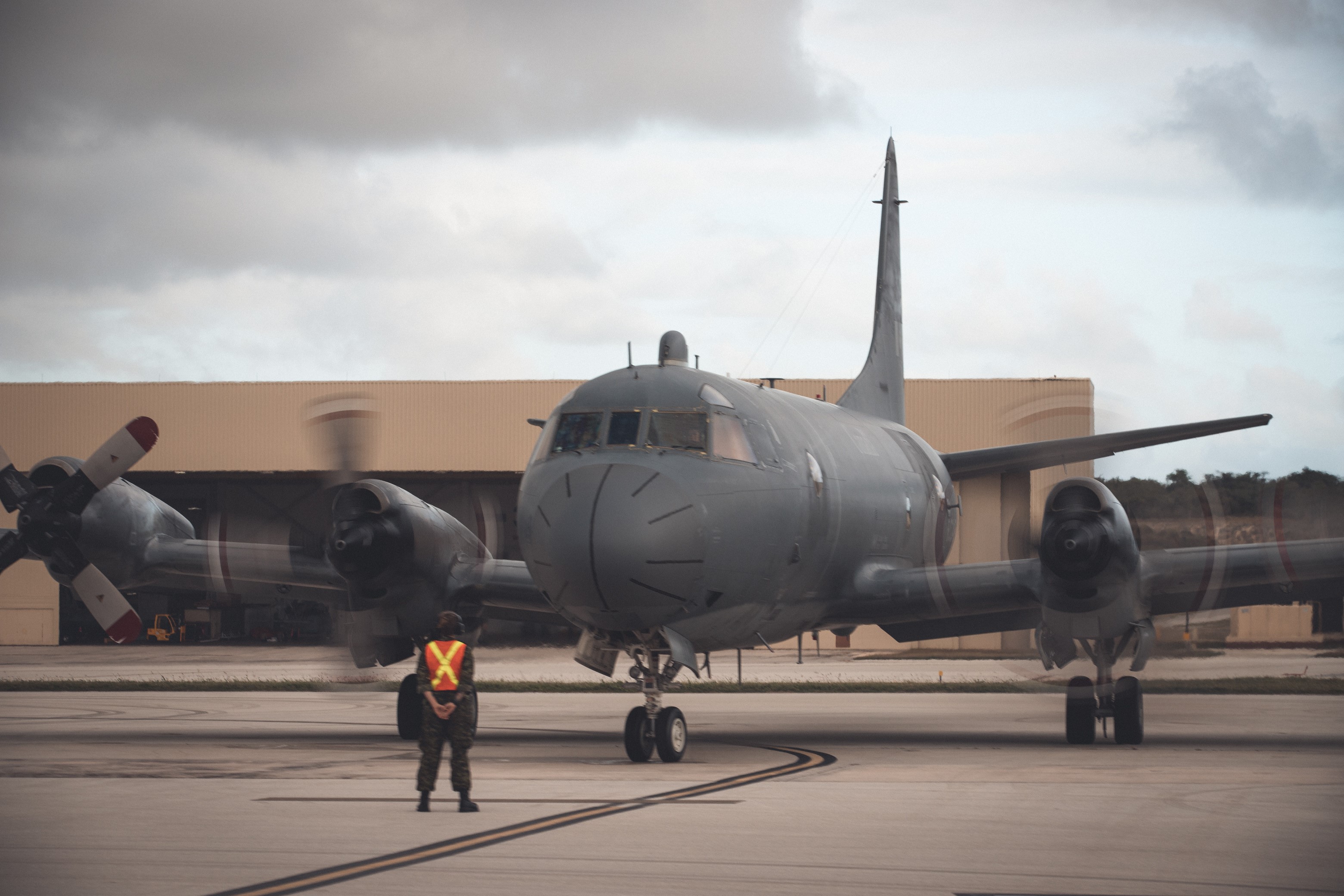 A Royal Canadian Air Force CP-140 Aurora aircraft from 407 Long Range Patrol Squadron prepares for a flight at Andersen Air Base, Guam, on 19 January 2021 during Exercise Sea Dragon, a multinational anti-submarine exercise hosted by the United States Navy. PHOTO: Petty Officer 1st Class Glenn Slaughter, United States Navy